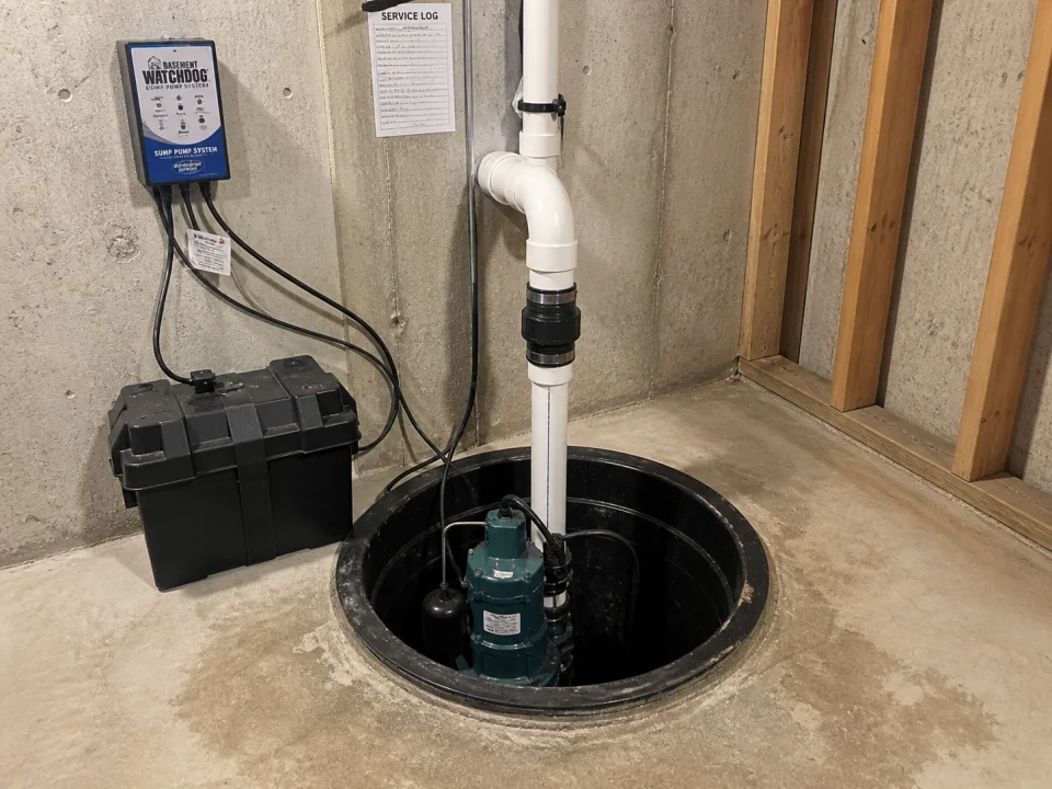 Dual submersible sump pump basin with battery backup in Bergen County